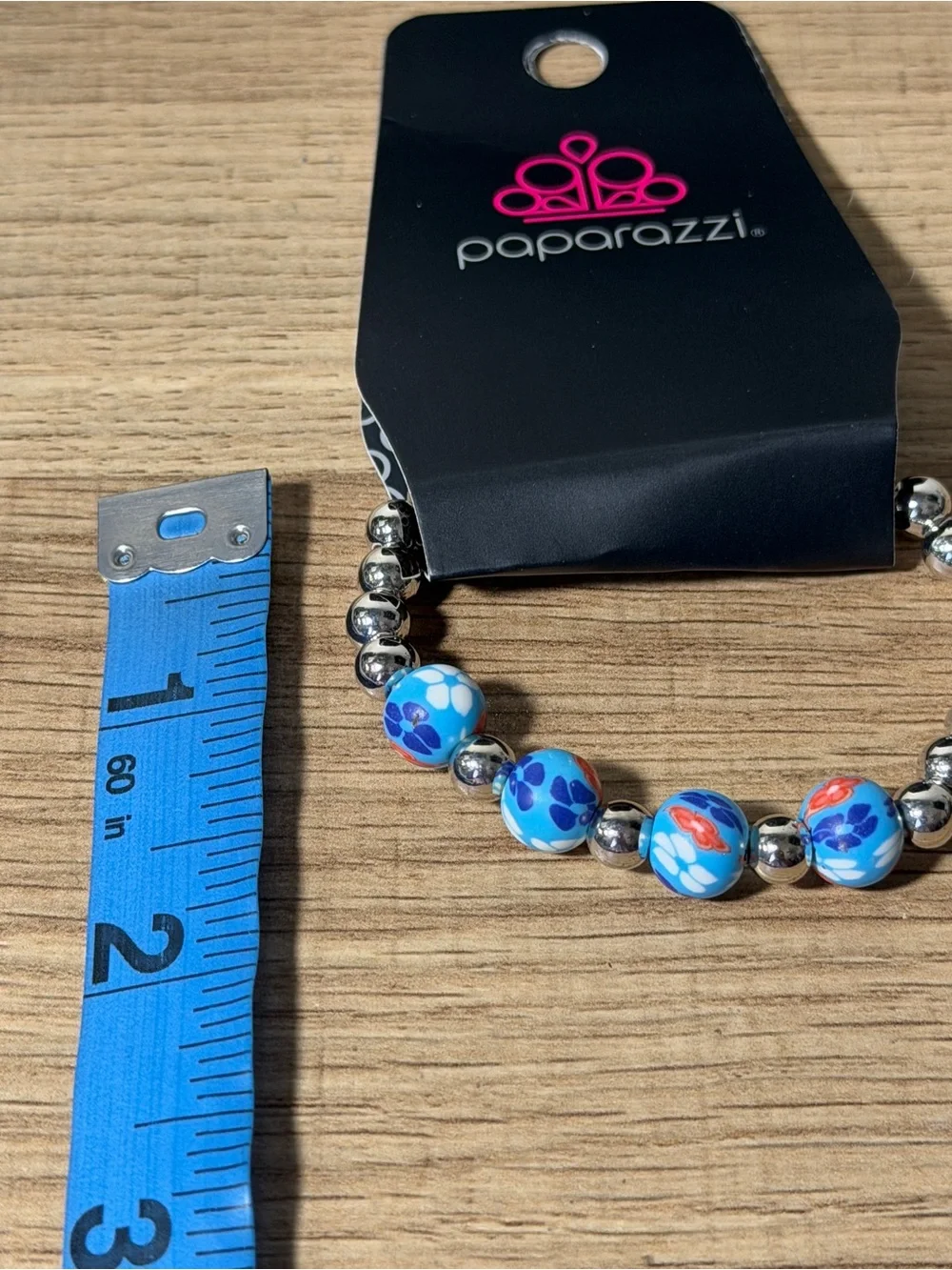 paparazzi Blue Floral Stretch Bracelet with Silver Beads and Red Accents